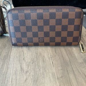 Brown checkered wallet orange inside